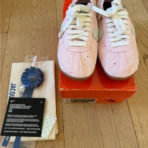 Nike Women's Pink and White Classic Leather Athletic Sneakers